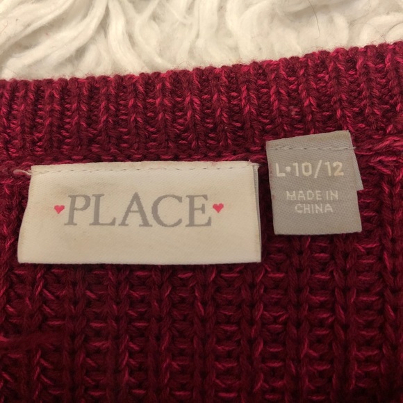 Red sweater. - Picture 2 of 2